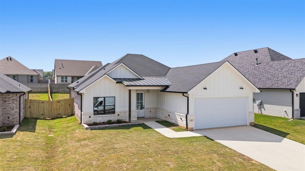 Front exterior of a new home in , Bullard, TX, highlighting curb appeal (Image 2). Front exterior of a new home in , Bullard, TX, highlighting curb appeal (Image 2).