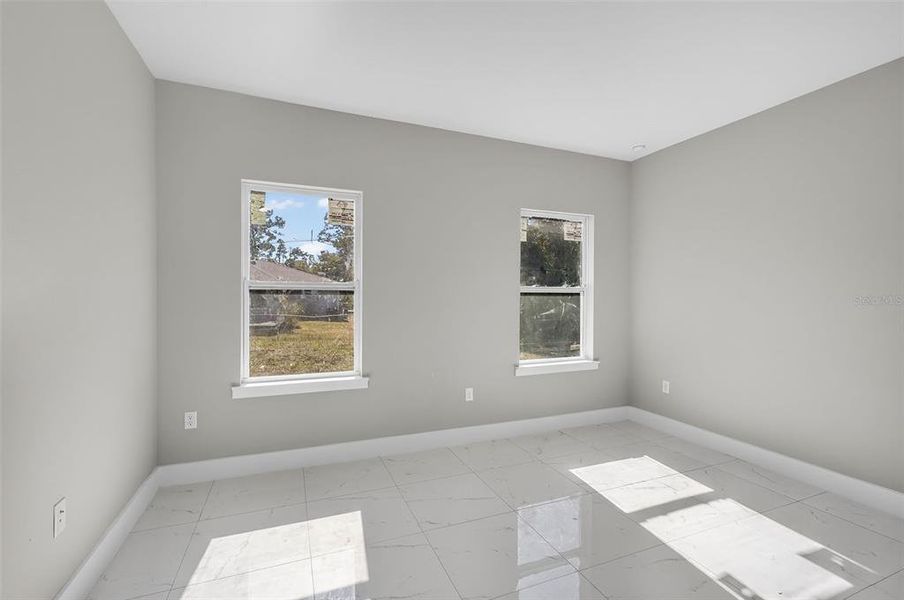 Spacious, unfurnished interior of a new home in , Port Charlotte (Image 18).