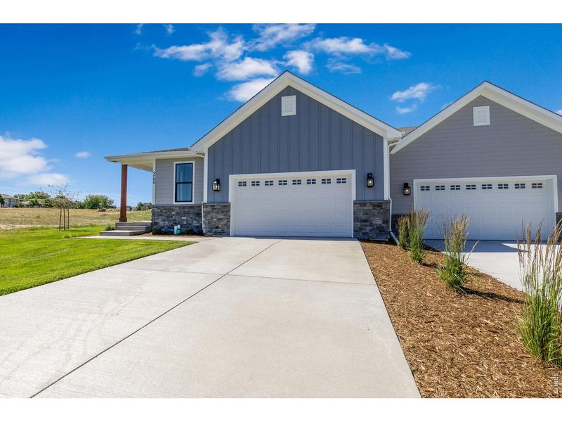 Front exterior of a new home in , Greeley, CO, highlighting curb appeal (Image 27). Front exterior of a new home in , Greeley, CO, highlighting curb appeal (Image 27).