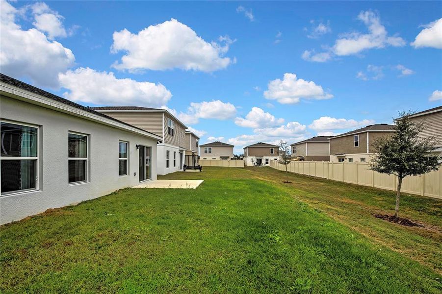 Exterior details and patio area of a home in , Sumterville (Image 34).