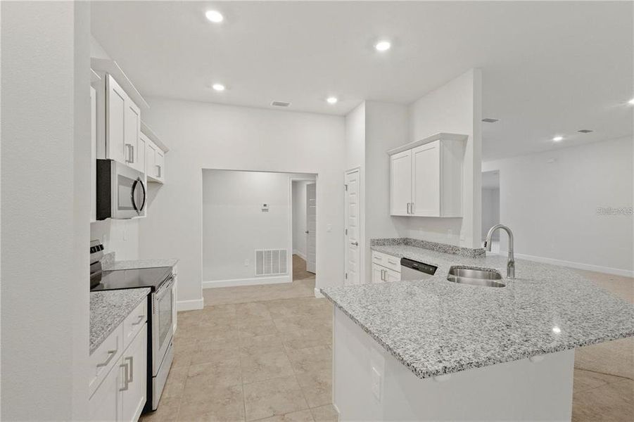 Stock photo. Home will be similar colors and material will vary.