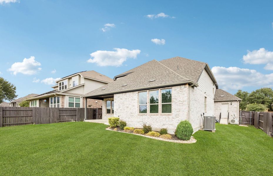 Exterior details and patio area of a home in Crescent Bluff, Georgetown (Image 22).