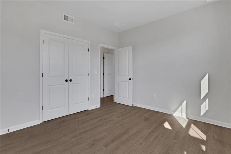 Spacious, unfurnished interior of a new home in The Paddocks at Doc Hughes, Buford (Image 50).