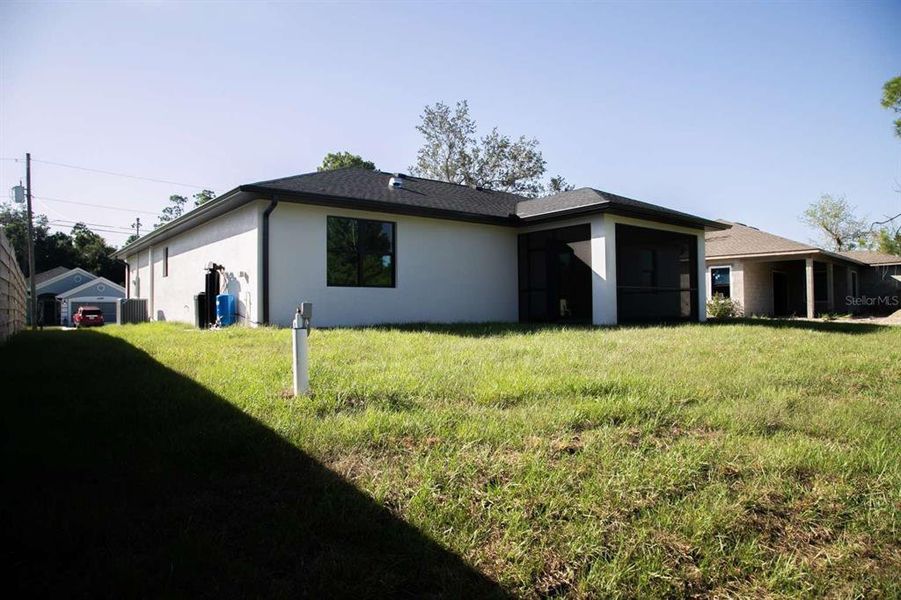 Exterior details and patio area of a home in , North Port (Image 33).