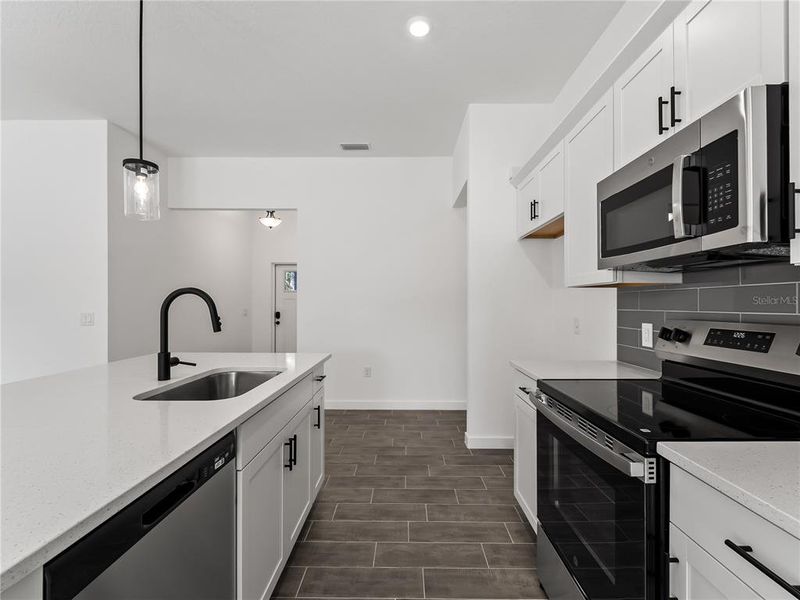 Furnished interior view inside a new home in , North Port (Image 3).