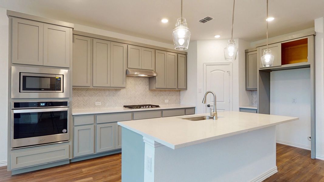 Representative furnished interior of a home built from the Sterling by Ashton Woods in Gateway Parks, Forney (Image 8).