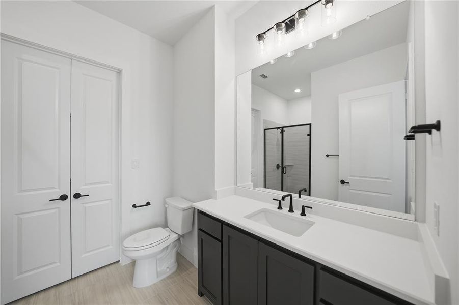 Furnished interior view inside a new home in Light Farms Graham/Reagan, Celina (Image 19). Furnished interior view inside a new home in Light Farms Graham/Reagan, Celina (Image 19).