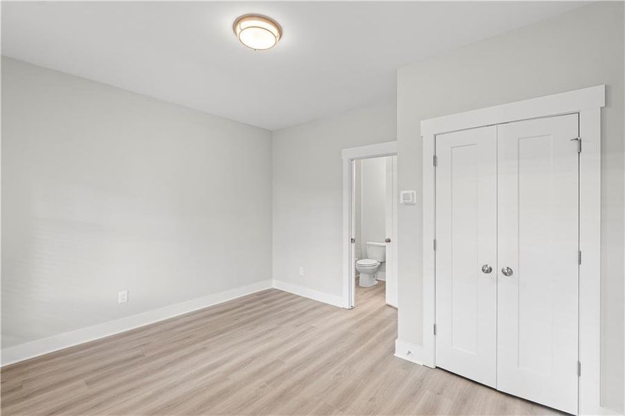 Spacious, unfurnished interior of a new home in Devin's Shire - A Kennesaw Tradition, Kennesaw (Image 16).