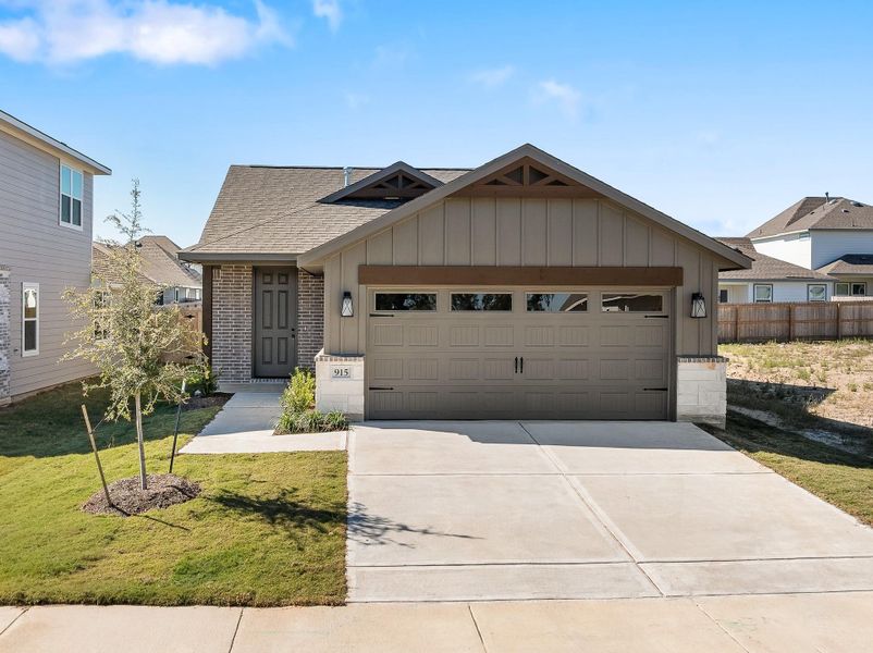 Front exterior of a new home in , College Station, TX, highlighting curb appeal (Image 1). Front exterior of a new home in , College Station, TX, highlighting curb appeal (Image 1).