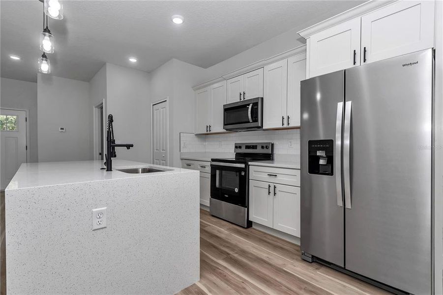 Furnished interior view inside a new home in , Dunnellon (Image 9).