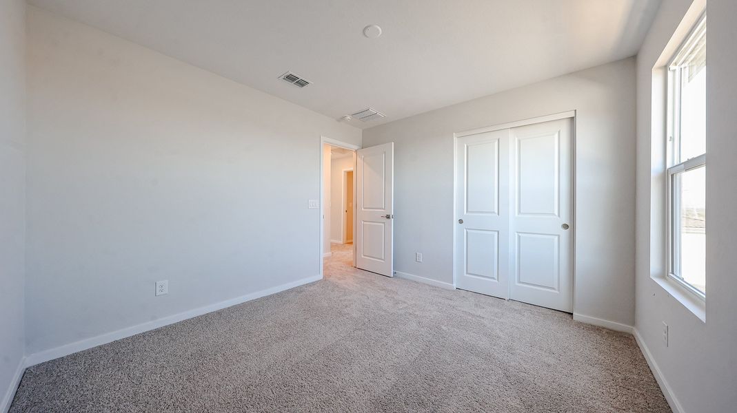 A room with white doors.