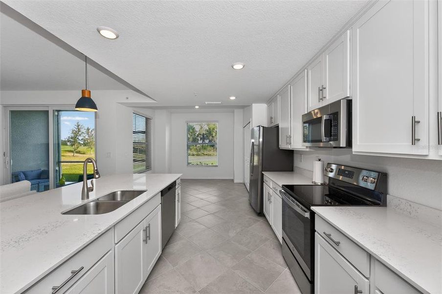 Furnished interior view inside a new home in Wellen Park Golf & Country Club, Venice (Image 45).