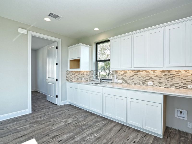 Representative furnished interior of a home built from the Casita by Giddens Homes in Whispering Wind, Bertram (Image 8).
