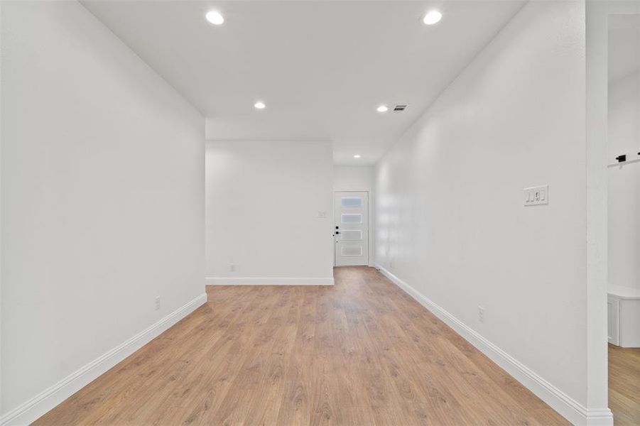 Spare room with light hardwood / wood-style floors