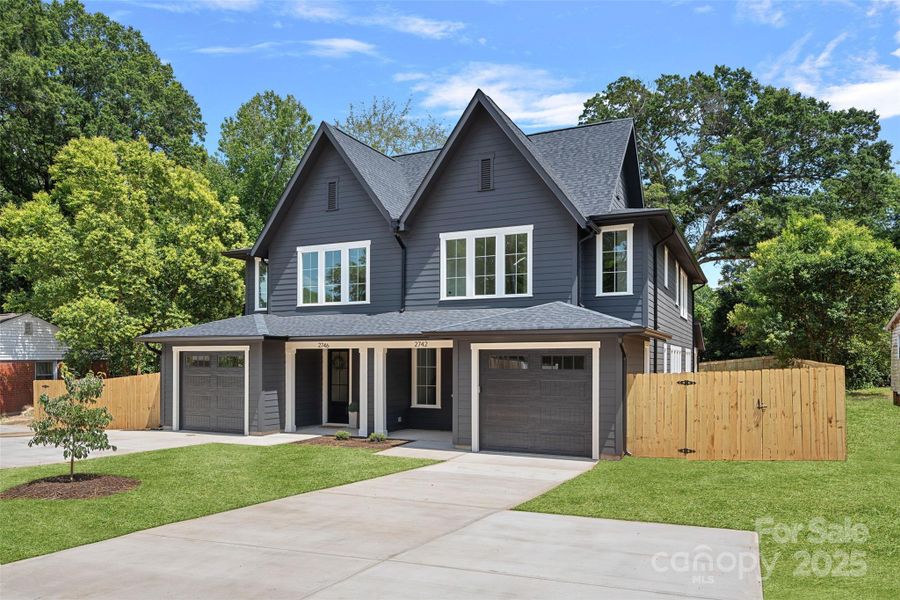 Front exterior of a new home in , Charlotte, NC, highlighting curb appeal (Image 1).