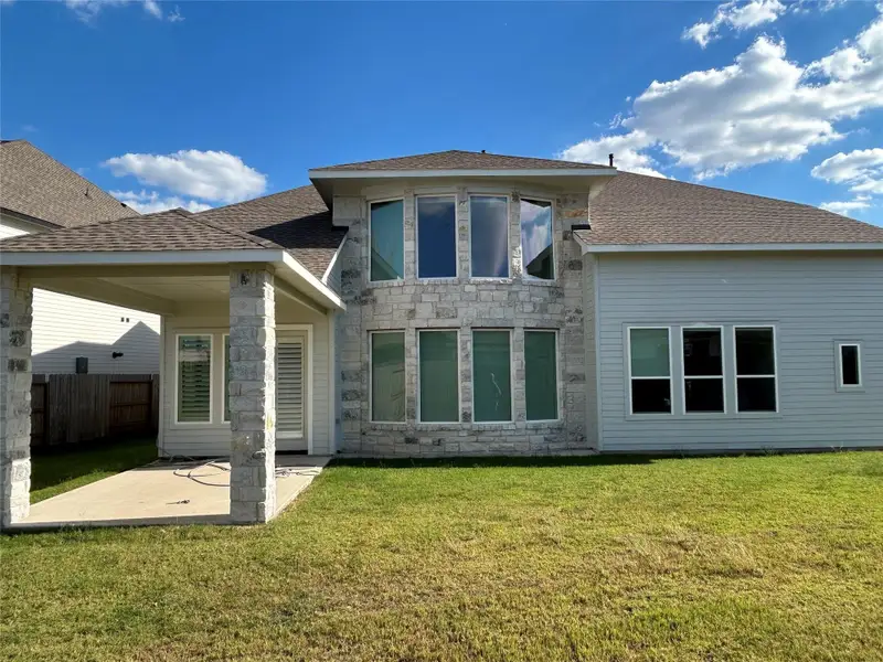 Exterior details and patio area of a home in Fulshear Lakes - 60', Fulshear (Image 2). Exterior details and patio area of a home in Fulshear Lakes - 60', Fulshear (Image 2).