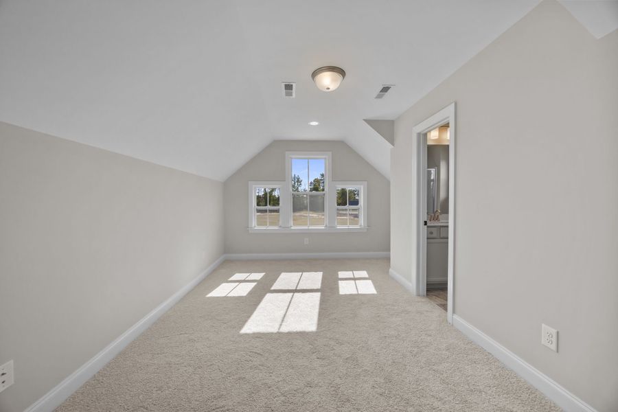 Spacious, unfurnished interior of a new home in The Preserve at Langston, Winterville (Image 51).