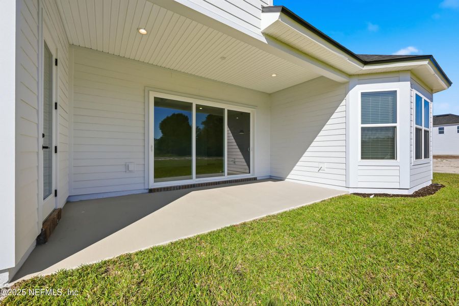 Exterior details and patio area of a home in Silver Landing At Silverleaf, St. Augustine (Image 3).