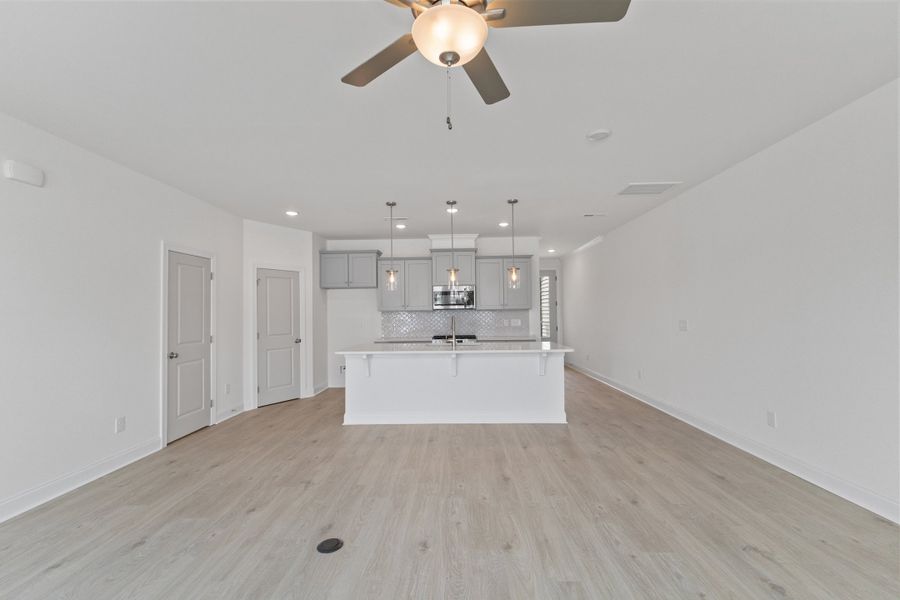 Representative unfurnished interior of a home built from the The Hemlock by RobuckHomes in Kennebec Crossing, Angier (Image 129).