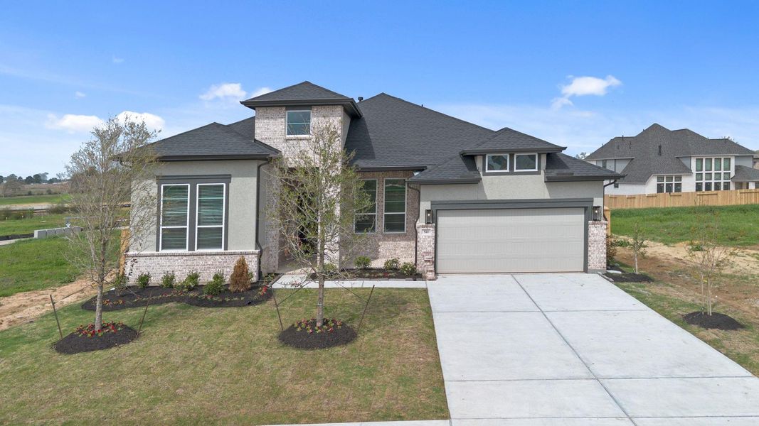 Front exterior of a new home in Briarley, Montgomery, TX, highlighting curb appeal (Image 22).