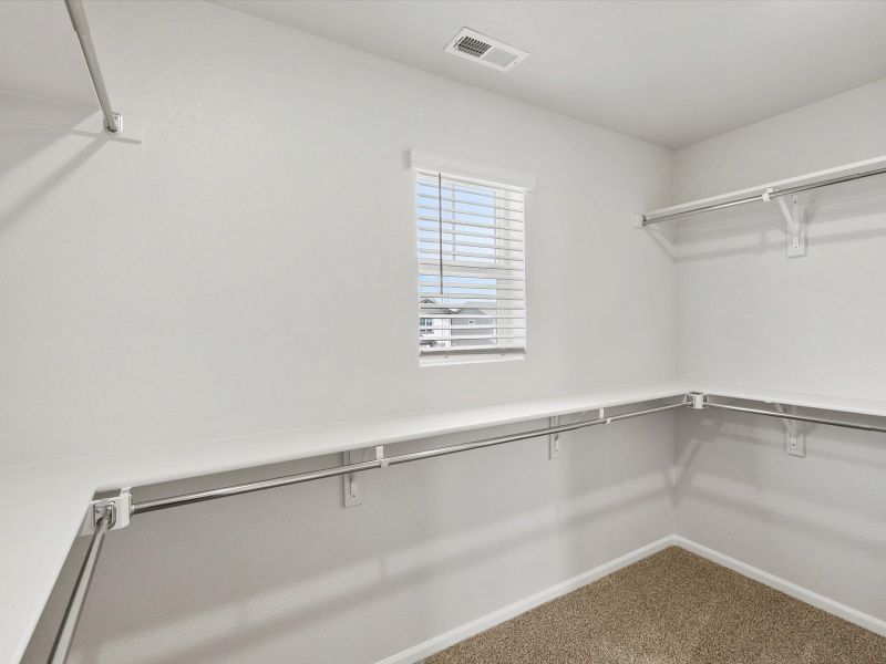 Spacious, unfurnished interior of a new home in Frontier Estates - The Flora Collection, Firestone (Image 12). Spacious, unfurnished interior of a new home in Frontier Estates - The Flora Collection, Firestone (Image 12).