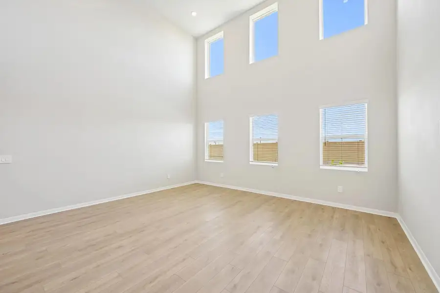 Stunning two-story great room - Representative images and renderings are for illustrative purposes