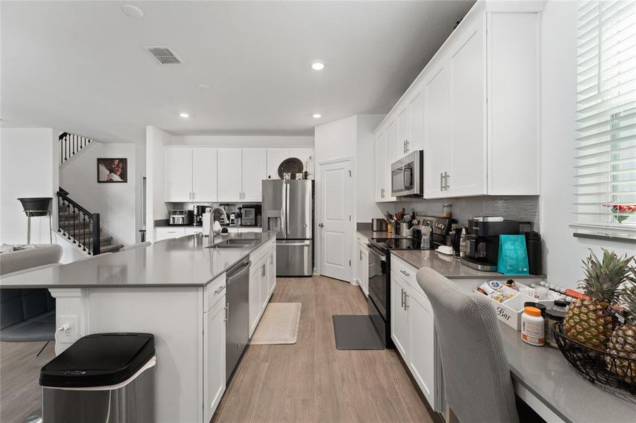 Furnished interior view inside a new home in Storey Park: Innovation Manor Collection, Orlando (Image 7).