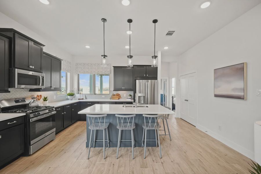 Representative furnished interior of a home built from the Tanlay by Chesmar Homes in Jordan Ranch Chateau and Courtyard, Fulshear (Image 5).