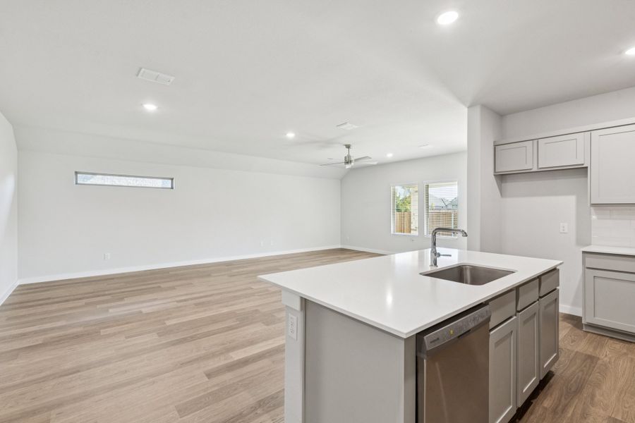 Open Floor Plan in the Oscar home plan by Trophy Signature Homes – REPRESENTATIVE PHOTO