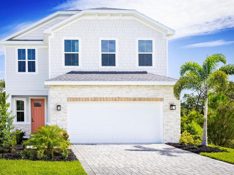 Front exterior of a new home in Malabar Springs, Palm Bay, FL, highlighting curb appeal (Image 1). Front exterior of a new home in Malabar Springs, Palm Bay, FL, highlighting curb appeal (Image 1).