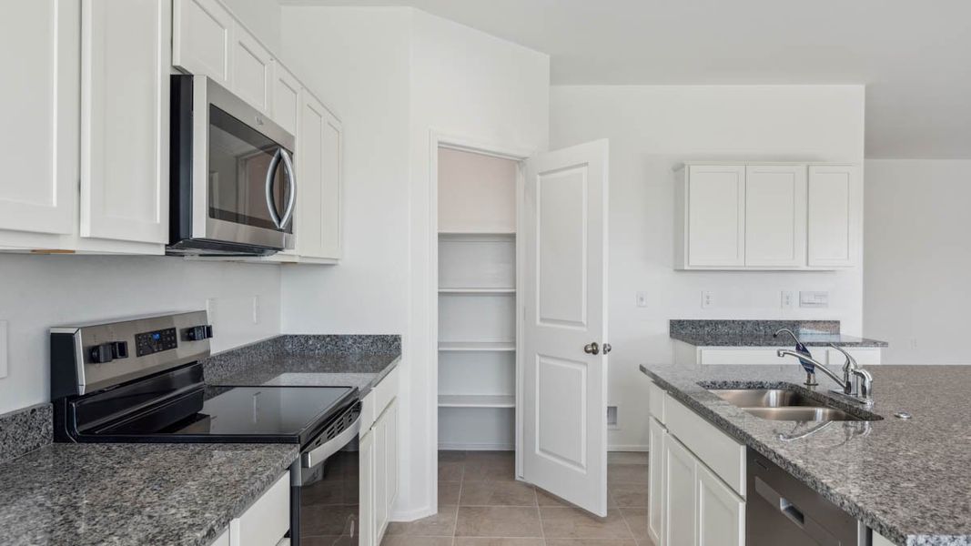 Furnished interior view inside a new home in Carlton Commons, Casa Grande (Image 7). Furnished interior view inside a new home in Carlton Commons, Casa Grande (Image 7).