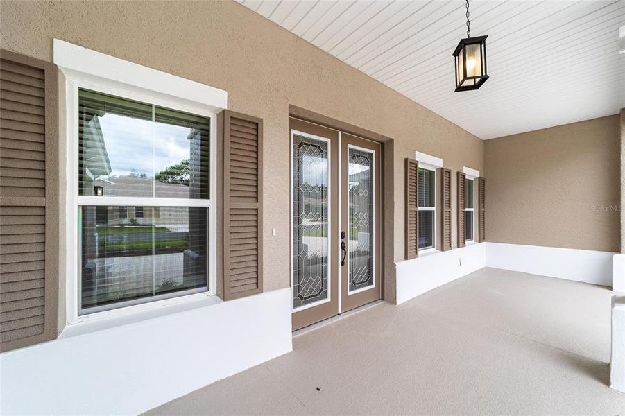 Exterior details and patio area of a home in On Top of the World Communities, Ocala (Image 22).