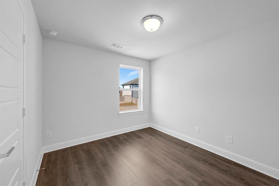 Spacious, unfurnished interior of a new home in Painted Tree Woodland West – Cottages, McKinney (Image 31).