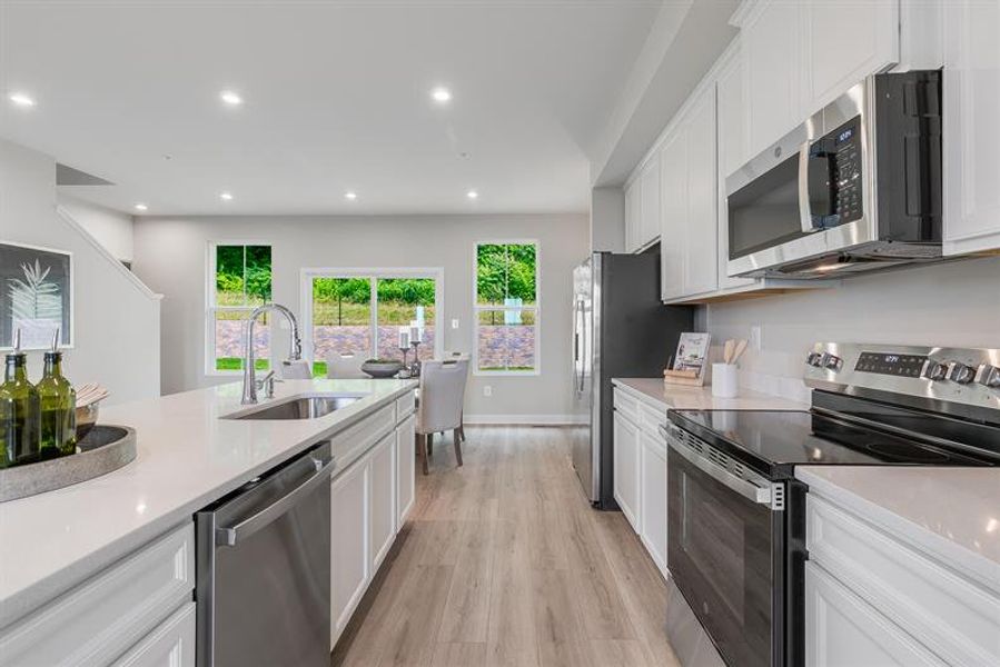 Representative furnished interior of a home built from the Overture by Ryan Homes in Moore Farm Townhomes, Indian Trail (Image 19).