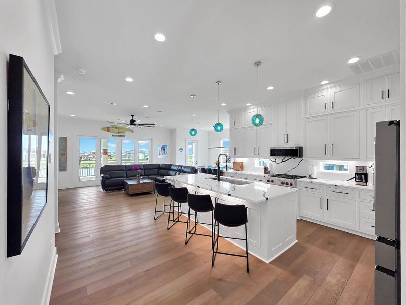 View from entryway of kitchen and living area