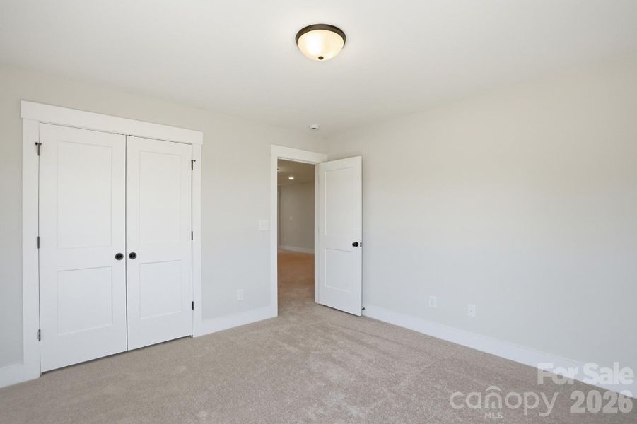 Spacious, unfurnished interior of a new home in Blythe Mill Townhomes, Waxhaw (Image 28).
