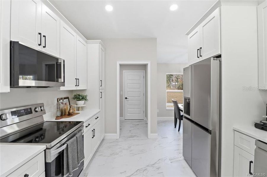 Furnished interior view inside a new home in , Citrus Springs (Image 18).