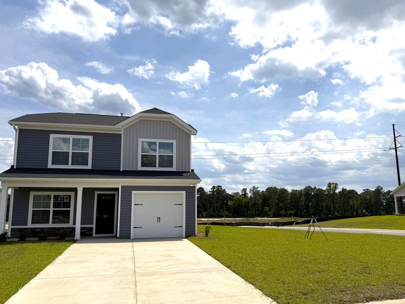 Front exterior of a new home in Reserve at Mill Creek, Columbia, SC, highlighting curb appeal (Image 17).
