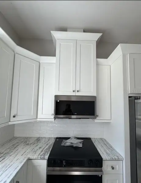 Furnished interior view inside a new home in , Port Charlotte (Image 4). Furnished interior view inside a new home in , Port Charlotte (Image 4).