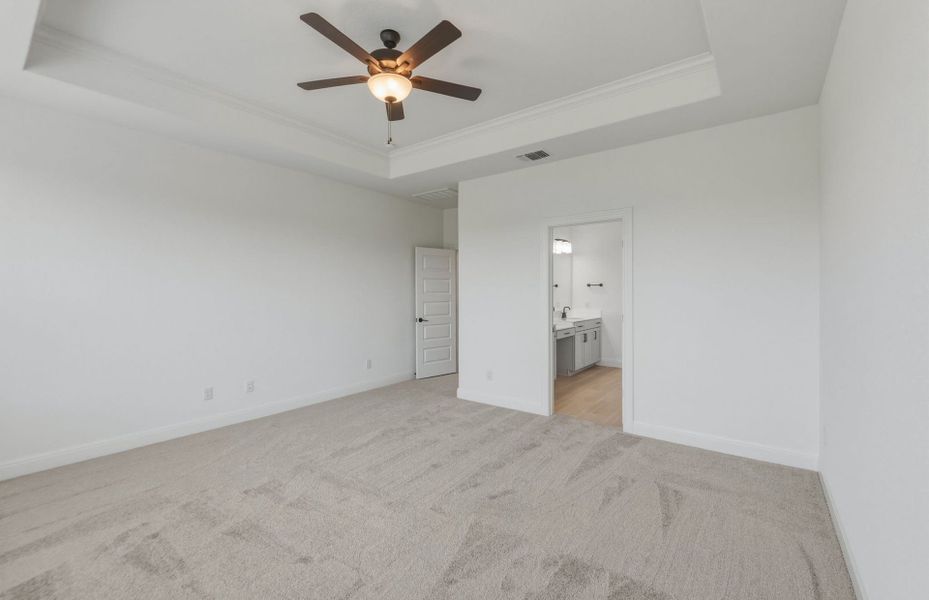 Representative unfurnished interior of a home built from the Woodland by Pulte Homes in Santa Rita Ranch, Liberty Hill (Image 12).