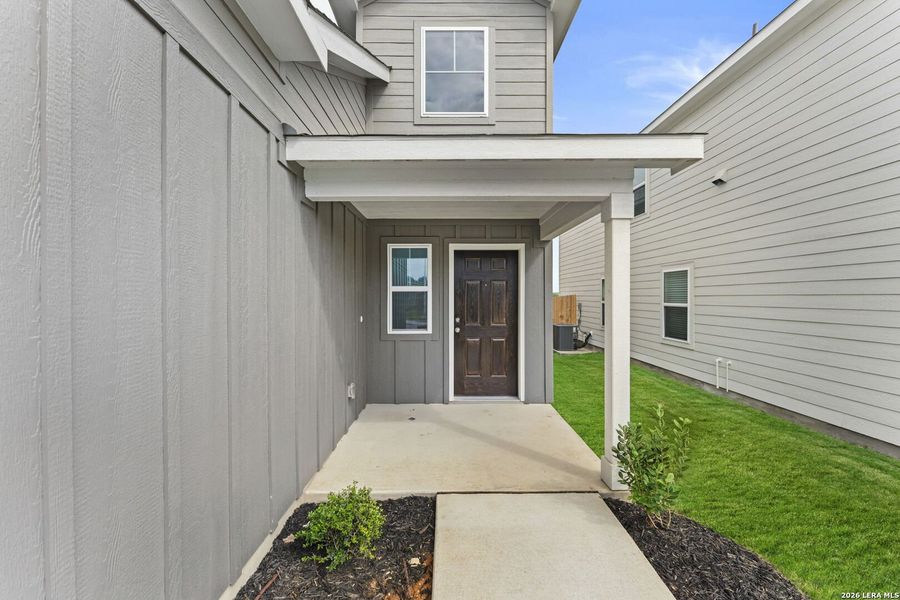 Exterior details and patio area of a home in Dove Song, Marion (Image 3).