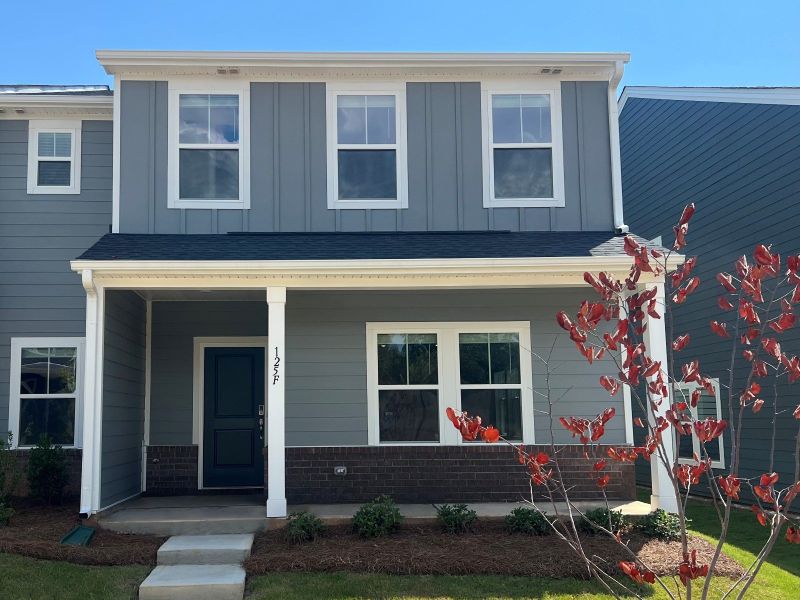 Front exterior of a new home in Crossrail Station, Mooresville, NC, highlighting curb appeal (Image 2).