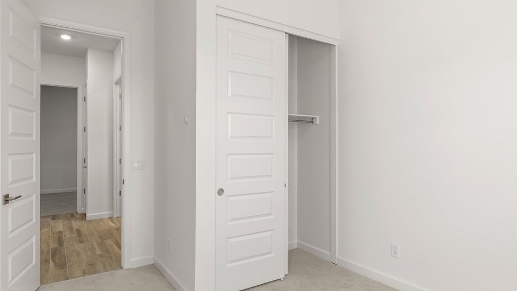 Representative unfurnished interior of a home built from the Plan by D.R. Horton in The Ridge at Stone Butte, Phoenix (Image 17).