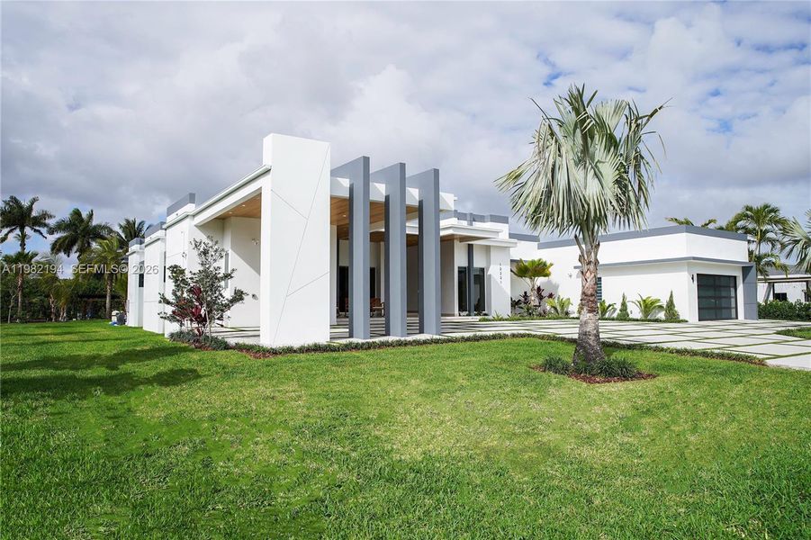 Front exterior of a new home in , Miami, FL, highlighting curb appeal (Image 24).