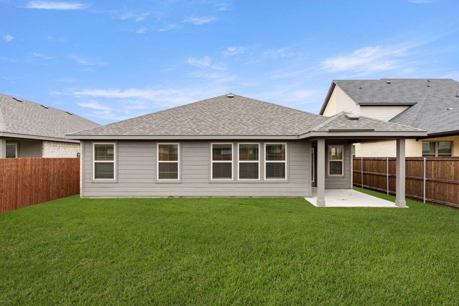 Representative exterior photo of a completed home built from the Cheyenne by Impression Homes in DeBerry Reserve, Royse City, TX (Image 25).