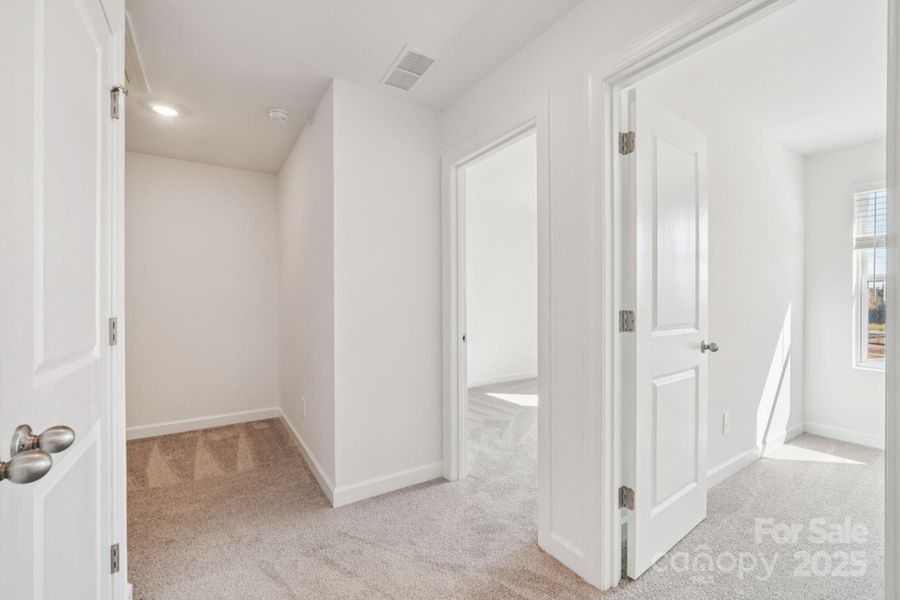 Spacious, unfurnished interior of a new home in Meadows at Wilson Farms - The Heights Series, Fort Mill (Image 26). Spacious, unfurnished interior of a new home in Meadows at Wilson Farms - The Heights Series, Fort Mill (Image 26).