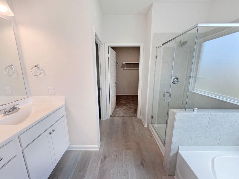 The Georgetown II- Primary Bathroom with Dual Sinks, and Walk-in Shower. Garden tub not included. Home under construction. Sample floor plan photo used for illustrative purposes only. Upgrades, selections options, windows and colors may vary.