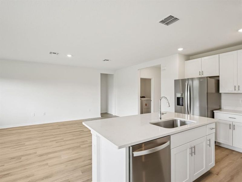 Furnished interior view inside a new home in The Reserve at Van Oaks, Auburndale (Image 3).