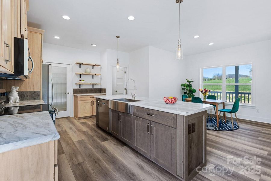 Thoughtfully designed with comfort and style in mind, this home offers a bright, airy open floor plan that’s ideal for both everyday living and entertaining.