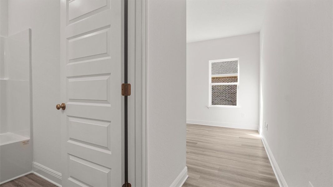 Representative unfurnished interior of a home built from the Madison by D.R. Horton in Owl's Head Farms, Freeport (Image 33).
